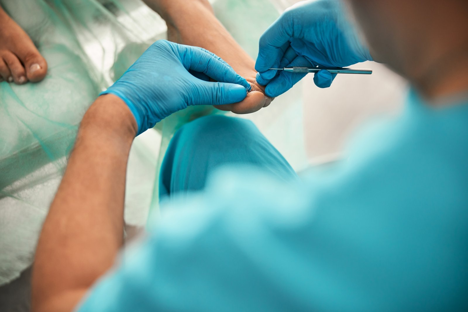 Close up of professional podologist doing medical pedicure