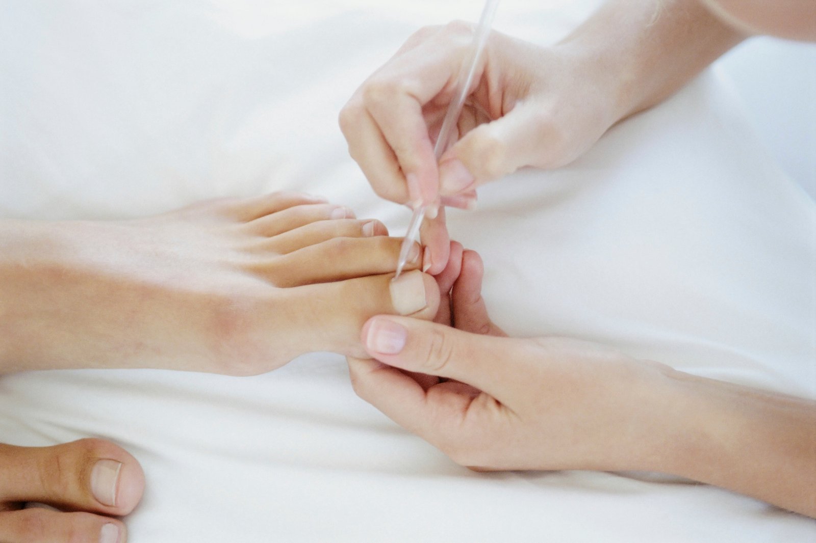 Woman receiving podiatry treatment